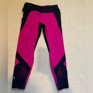 Athleta size medium pink and navy with mesh cutout leggings